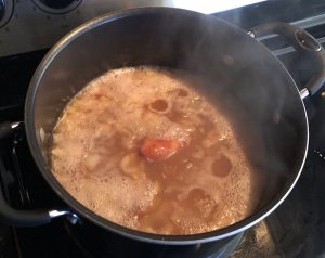 Red beans simmering one hour.